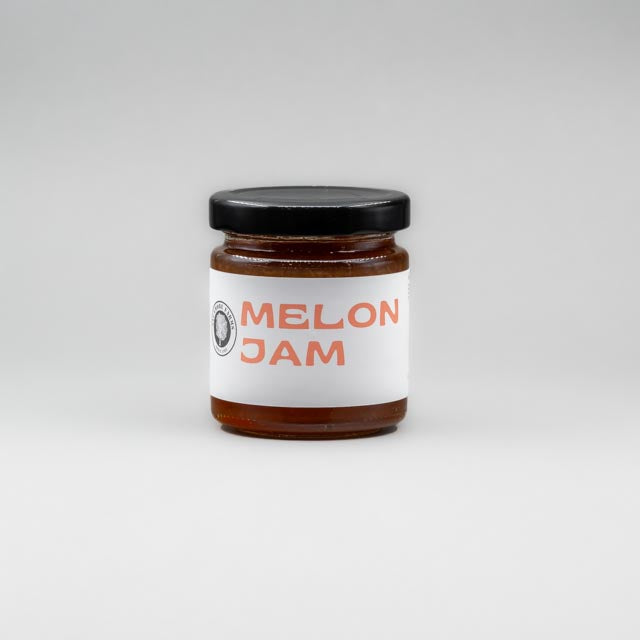 Sealed glass jar of small-batch local NY melon jam by Sycamore Farms, produced by M&K Provisions