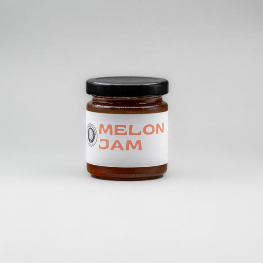 Sealed glass jar of small-batch local NY melon jam by Sycamore Farms, produced by M&K Provisions