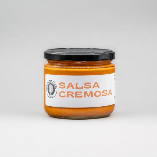 Sealed glass jar of small-batch local NY salsa cremosa by Sycamore Farms, produced by M&K Provisions