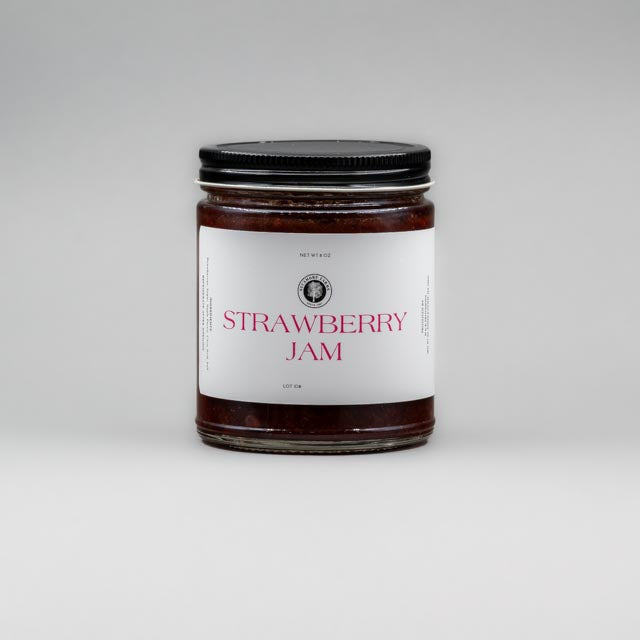 Sealed glass jar of small-batch local NY strawberry jam by Sycamore Farms, produced by M&K Provisions