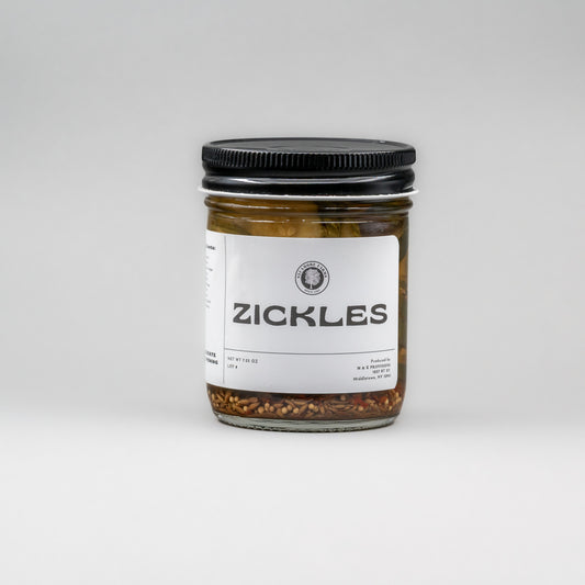 Sealed glass jar of small-batch local NY Zickles by Sycamore Farms, produced by M&K Provisions.